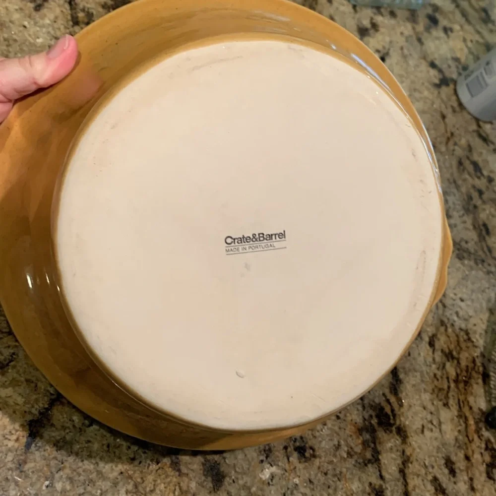 Crate & Barrel large bowl. Golden yellow.